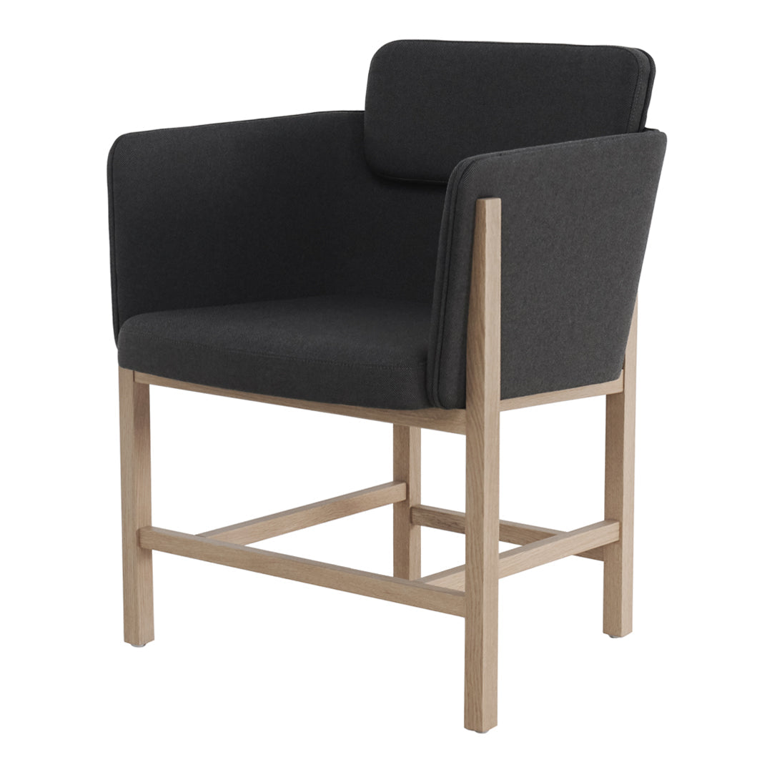 Black upholstered armchair with a minimalist wooden frame, showcasing a sleek modern design. Perfect for any space.