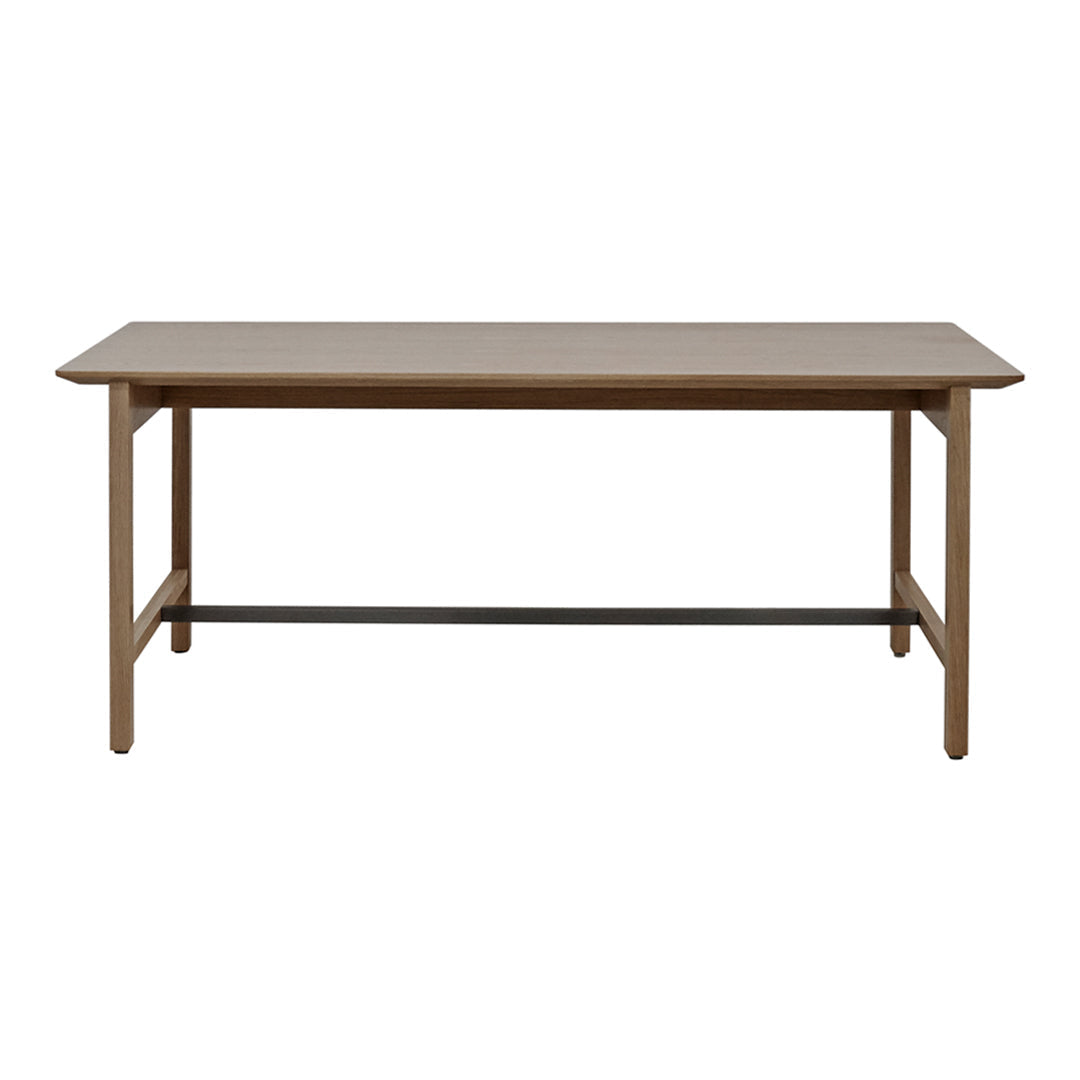 "Simple rectangular wooden table in warm brown with a sleek, minimalist design and black metal support."