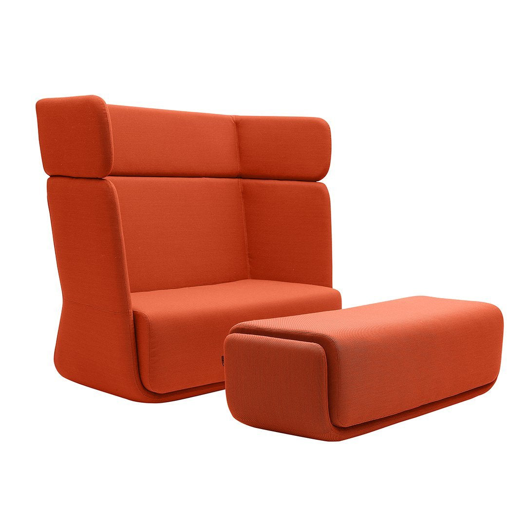 Vibrant orange sofa and ottoman set featuring a smooth, modern design with minimalistic patterns.