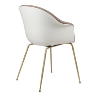 Modern white and beige chair with curved design and gold legs, perfect for stylish interiors.