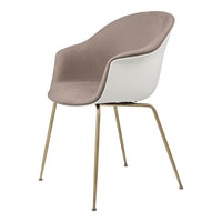 Modern chair featuring a soft beige seat and sleek white shell, complemented by elegant gold legs.