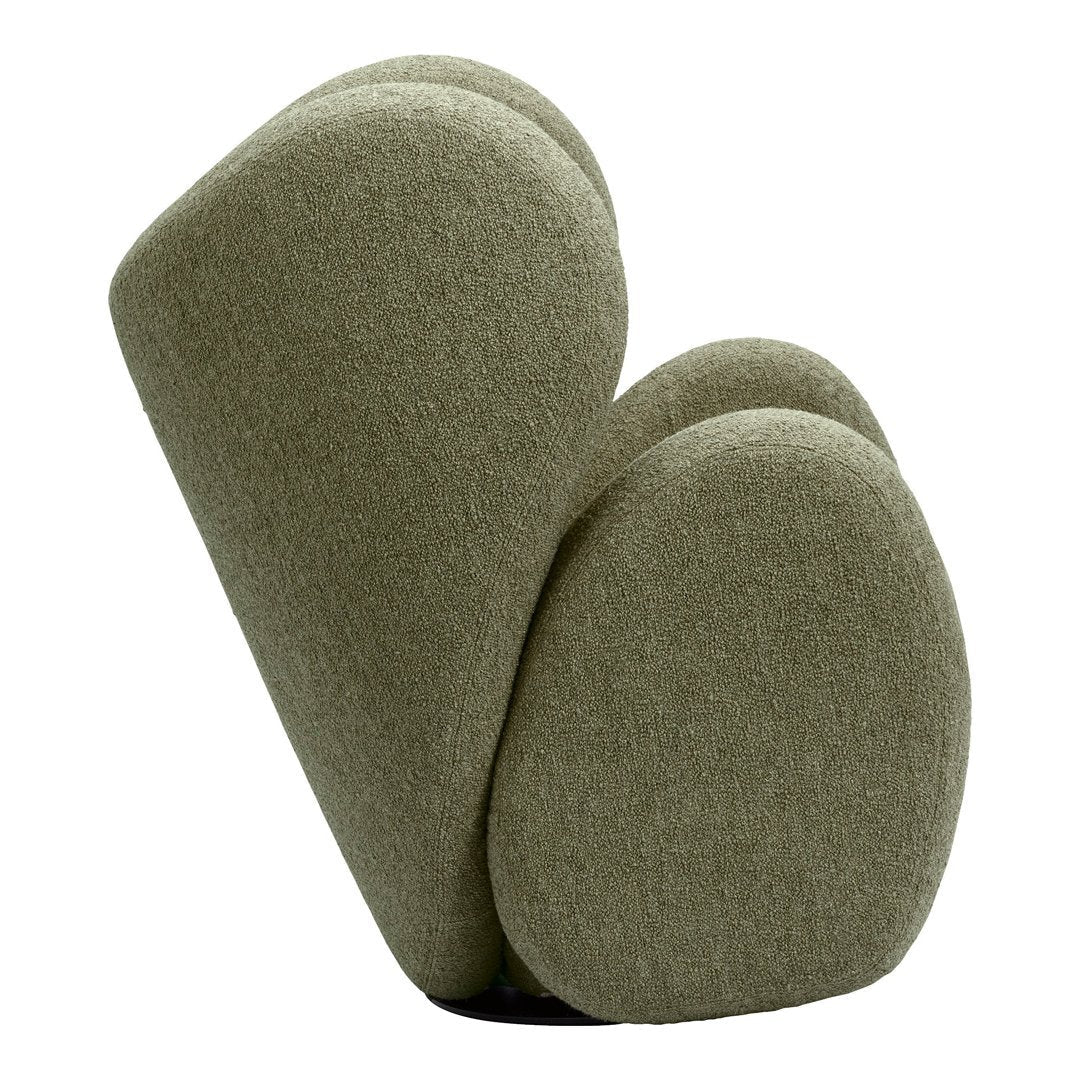 Soft, textured green upholstery with smooth, curvy shapes and modern design patterns. Ideal for contemporary decor.
