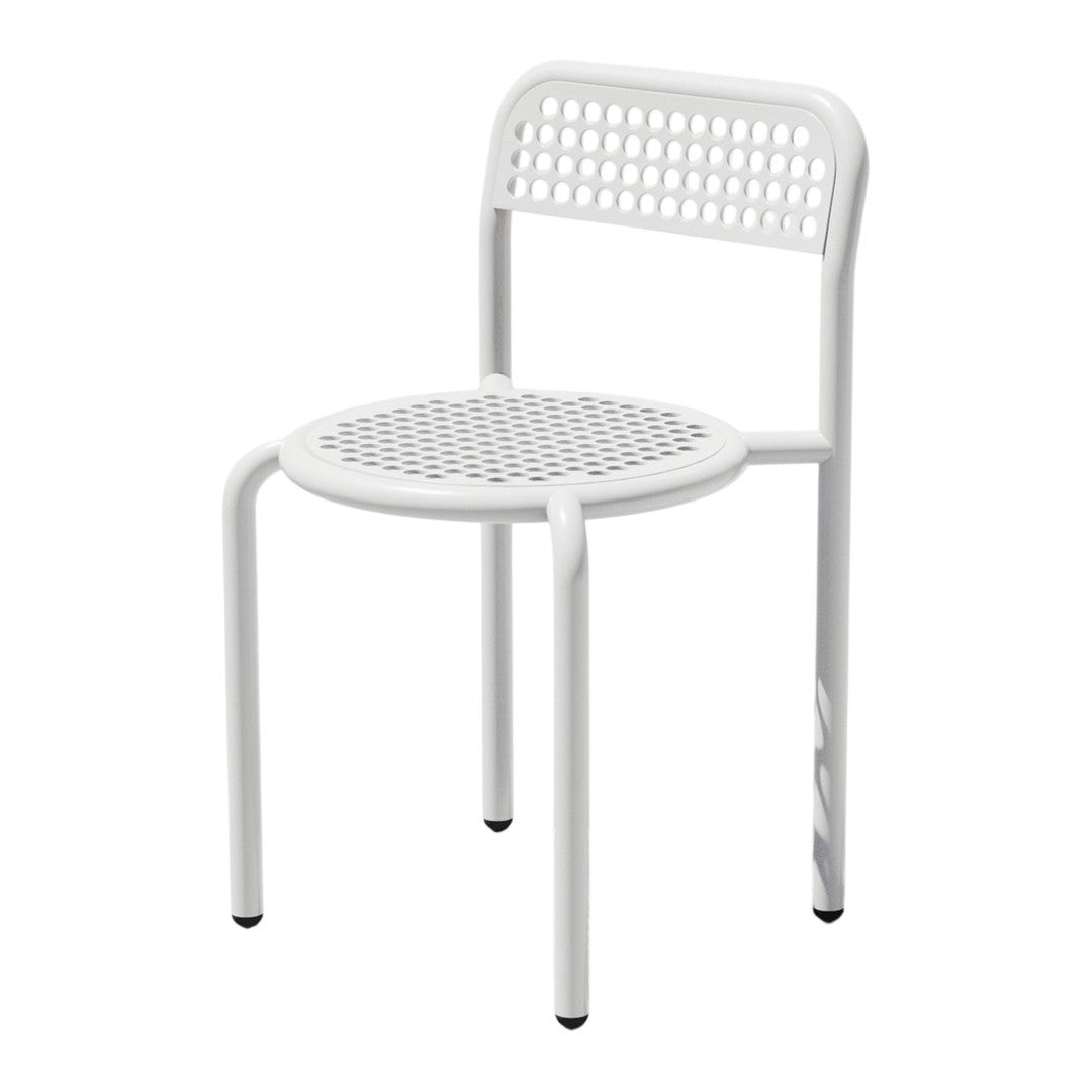 White perforated metal chair with a minimalist design and clean lines. Perfect for modern spaces.