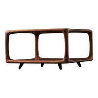Modern wooden coffee table with rich brown finish and sleek, geometric design. Perfect for stylish interiors.