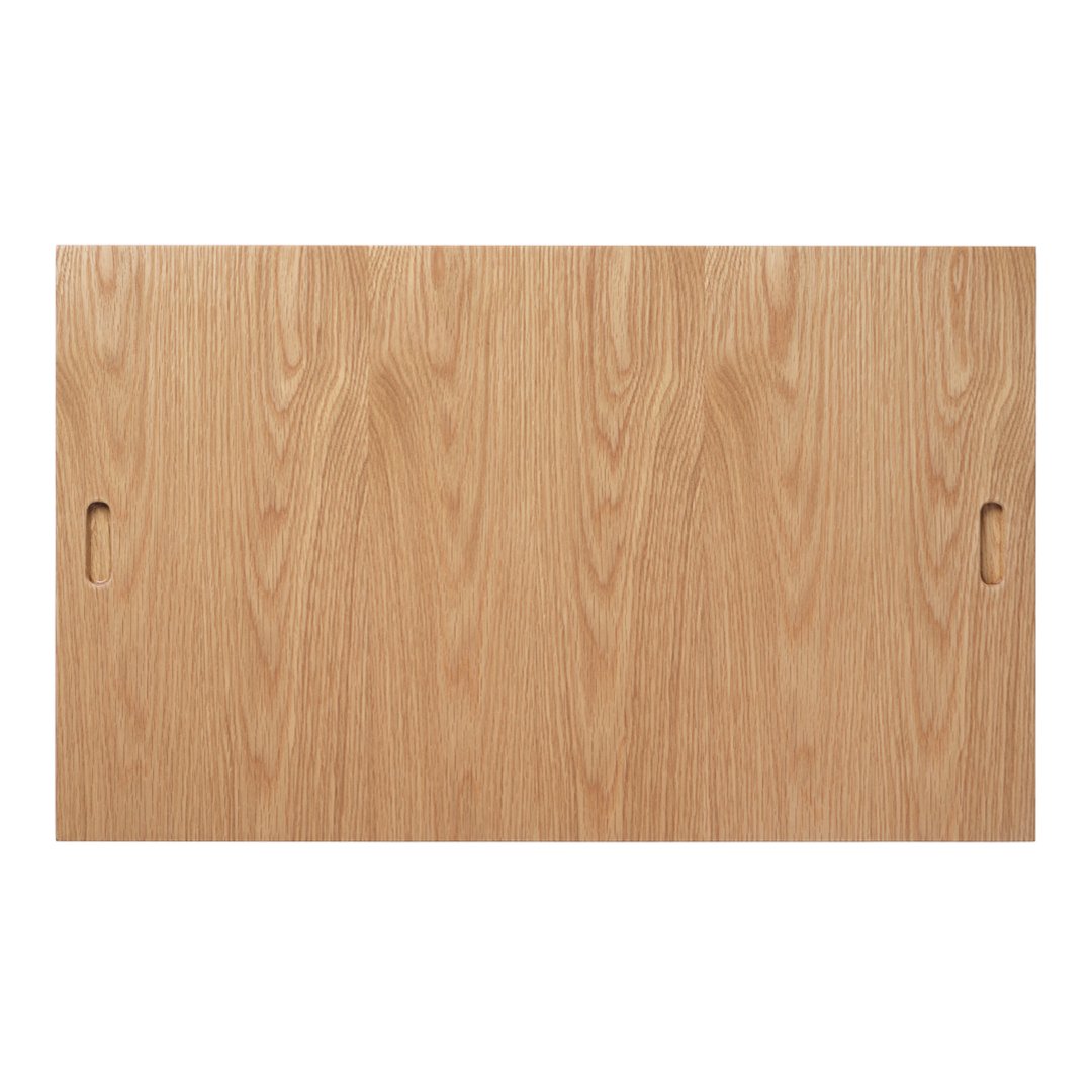 Light oak wood table surface with a smooth, natural grain pattern and two cut-out handles.