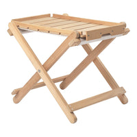 Light natural wood folding stool with a slatted top and cross-brace design. Ideal for versatile indoor or outdoor use.