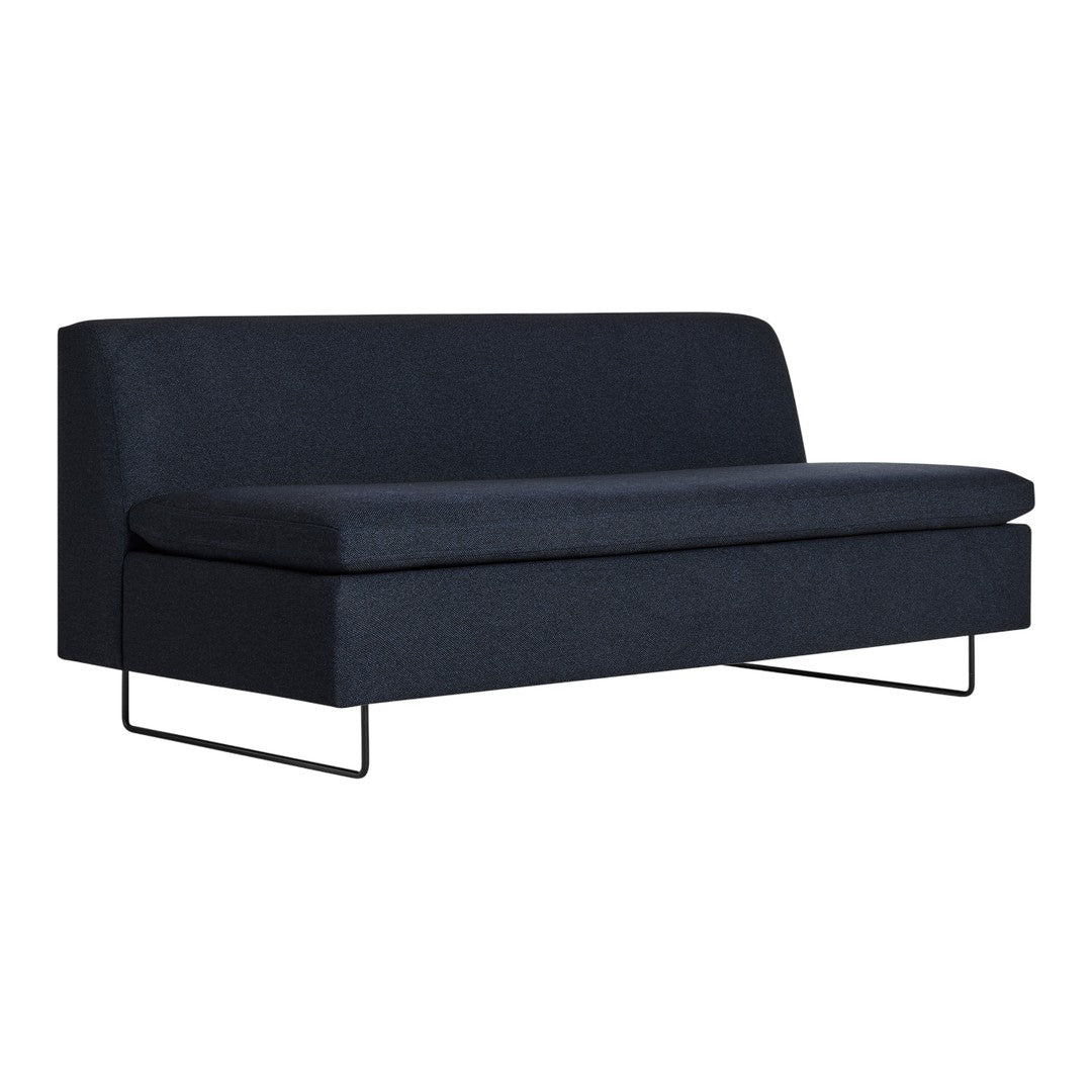 "Modern dark blue sofa with a smooth texture and minimalist design, featuring sleek black metal legs."