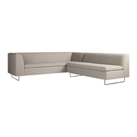 Light beige sectional sofa with a smooth, minimalist design and sleek metal legs. Ideal for modern interiors.