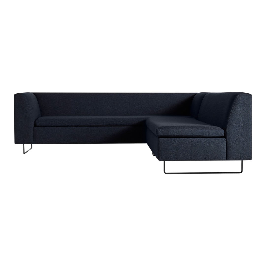 Dark blue sectional sofa with a textured fabric and sleek black metal legs, offering modern style and comfort.