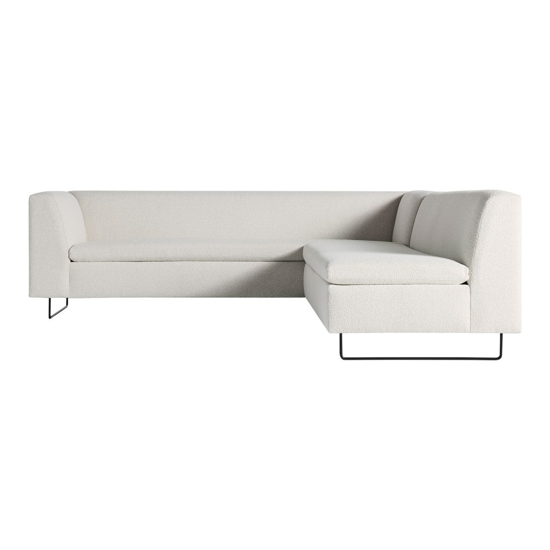 Modern light gray sectional sofa with a textured fabric and minimalist black metal legs. Perfect for contemporary interiors.
