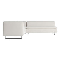 Modern white upholstery sectional sofa with subtle textured patterns and sleek black metal legs.
