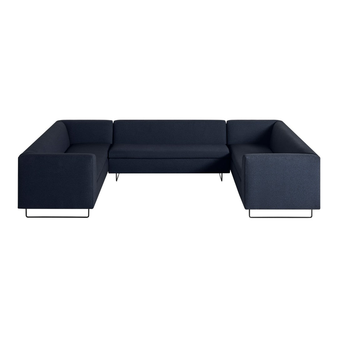 Navy blue sectional sofa with a sleek, modern design and minimalistic texture. Ideal for contemporary interiors.