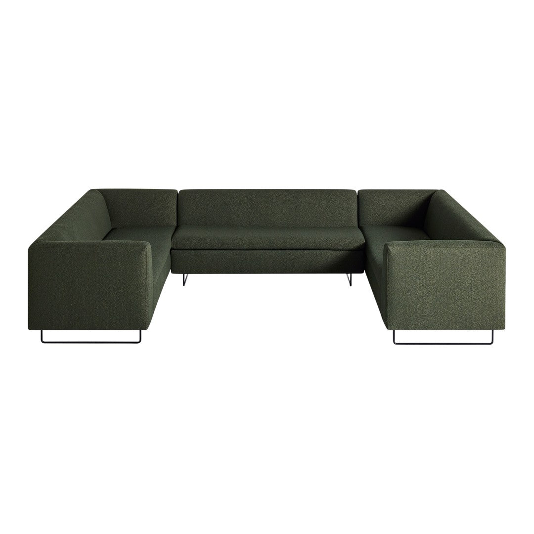 Dark green sectional sofa with a textured fabric pattern and sleek black metal legs, perfect for modern living spaces.