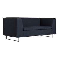 Modern dark blue sofa with a sleek, minimalist design and textured fabric. Perfect for contemporary interiors.