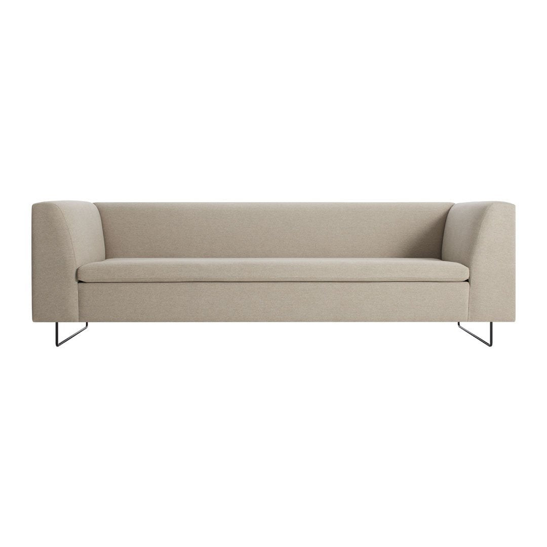 Beige modern sofa with clean lines and minimalist design, featuring a solid fabric upholstery and sleek metal legs.