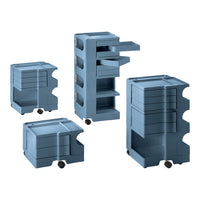 Stackable storage carts in muted blue, featuring smooth surfaces and minimalist design for organized simplicity.