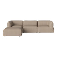 Beige sectional couch with a modern, minimalist design and smooth, textured fabric. Suitable for various interior styles.