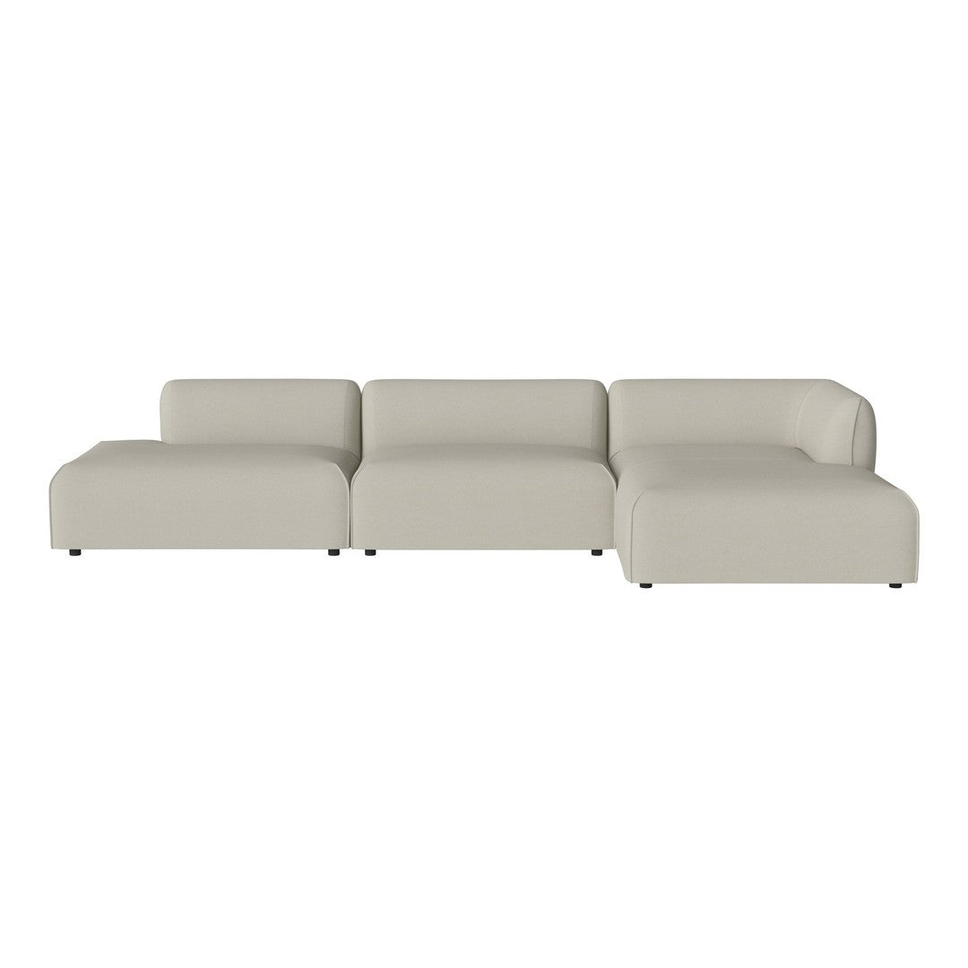 Light beige sectional sofa with a smooth, modern design and clean lines, perfect for contemporary living spaces.