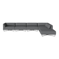 Modern sectional sofa in solid gray with clean lines and minimalist design, featuring sleek metal accents.