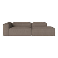 Stylish modular sofa in a warm taupe fabric with a smooth, minimalist design and no visible patterns.