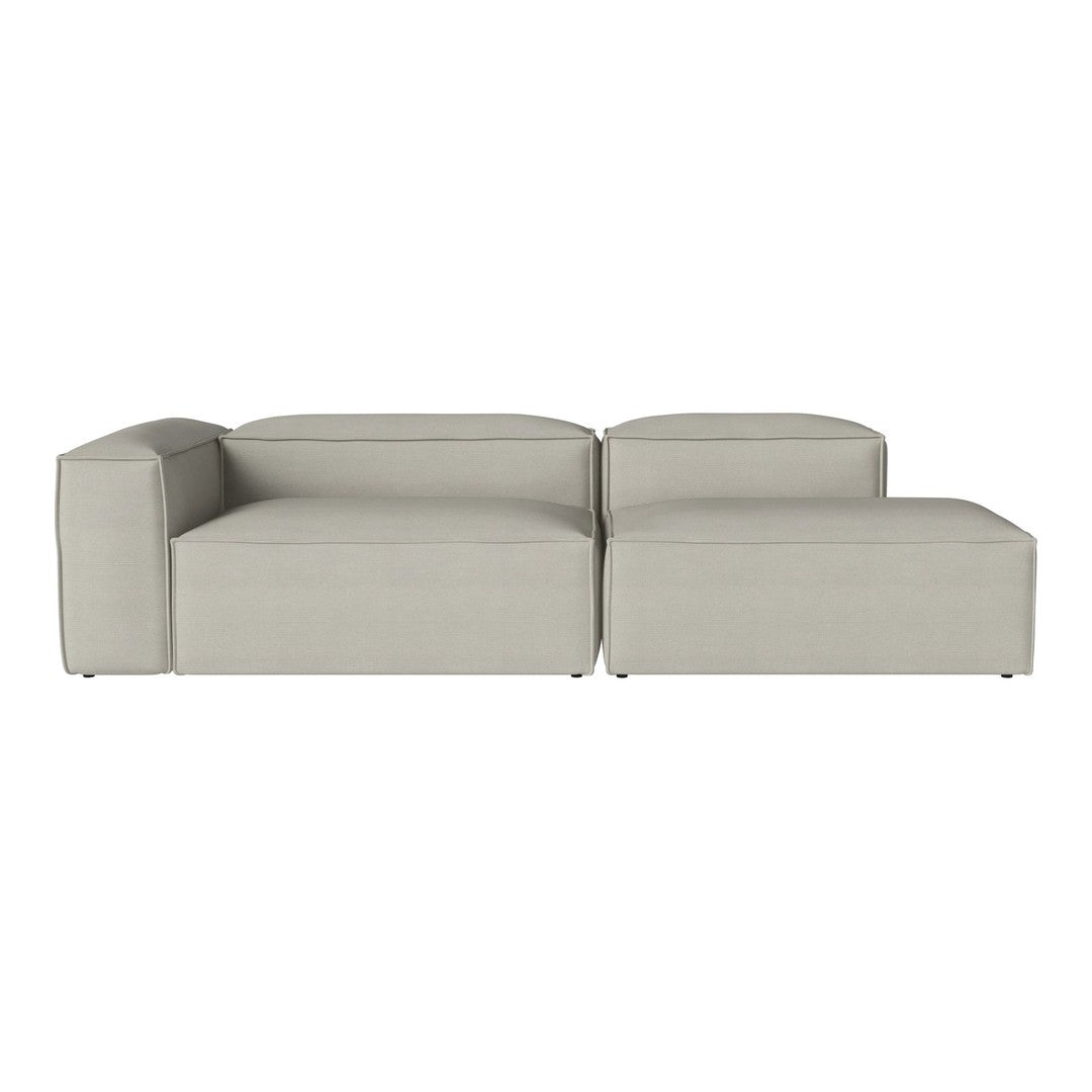 Light gray sectional sofa with a minimalist design and smooth, modern lines. Soft fabric texture complements any decor.