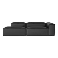 Modern black leather sectional sofa with sleek, minimal design and smooth surfaces. Perfect for contemporary decor.