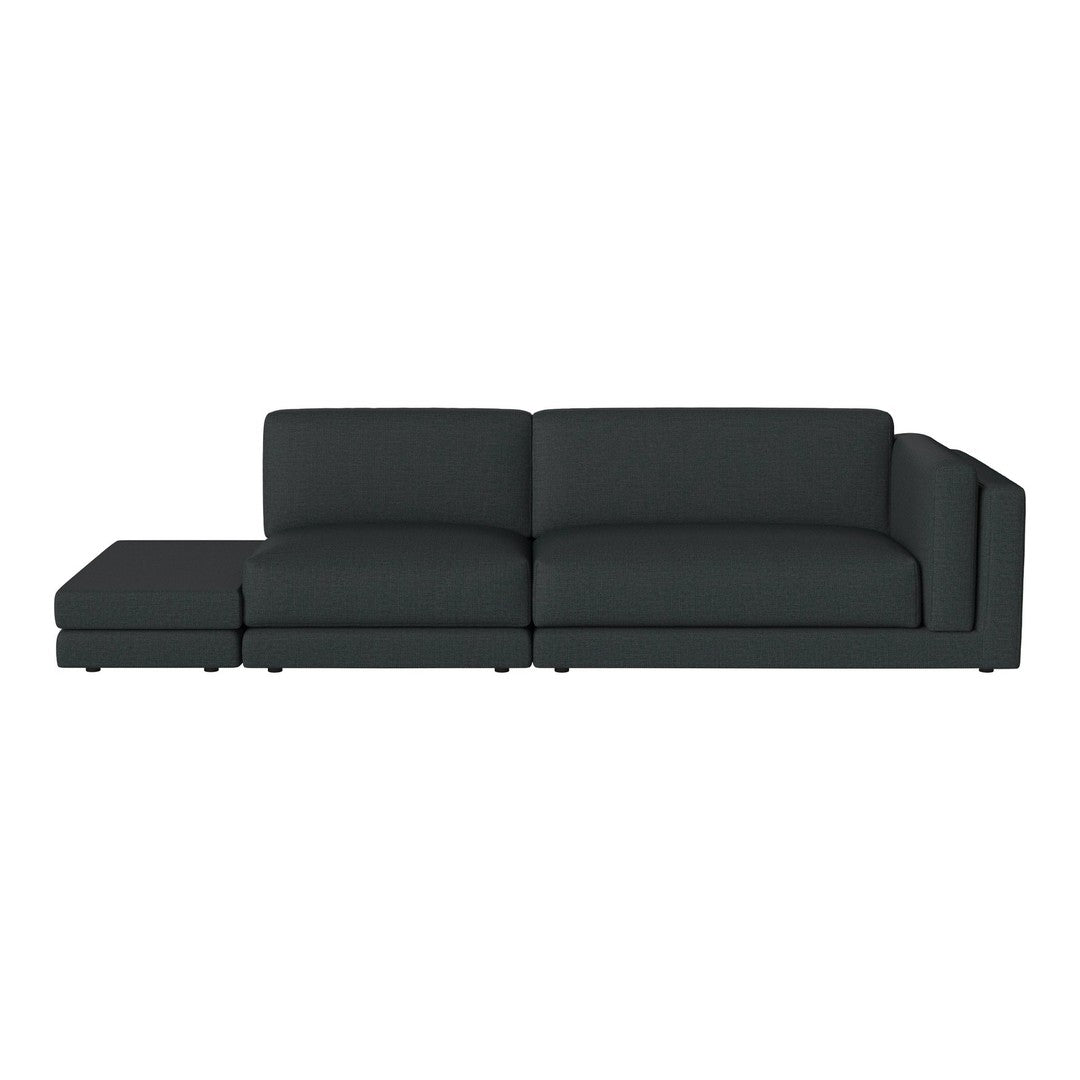 Modern dark gray sectional sofa with clean lines and a minimalist design, perfect for contemporary living spaces.