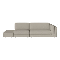 Light gray sectional sofa with a smooth, modern design and subtle texture. Perfect for contemporary interiors.