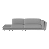 Gray sectional sofa with clean lines and a modern design, featuring a smooth fabric texture. Perfect for contemporary spaces.
