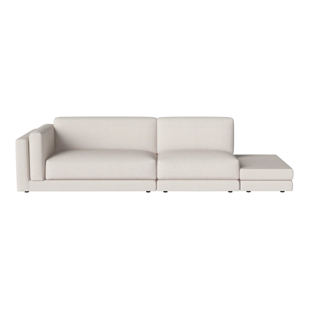 Modern beige sectional sofa with smooth, clean lines and no visible patterns, ideal for contemporary decor.