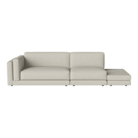 Light beige sectional sofa with a minimalist design and smooth fabric texture, perfect for modern living spaces.