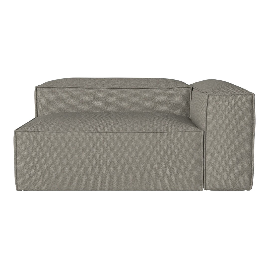 Gray modular sofa with a textured fabric pattern, featuring a minimalist design and soft edges. Ideal for modern decor.