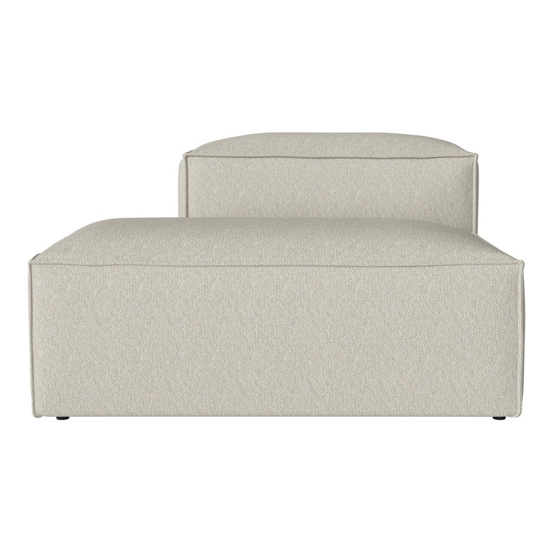 Light beige fabric chaise lounge with a subtle textured pattern, featuring a contemporary design and clean lines.