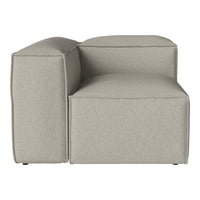 Light grey sectional sofa with a smooth, modern texture and minimalist design. Perfect for contemporary interiors.