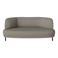 Stylish curved gray sofa with a smooth fabric surface and minimalist design, perfect for modern interiors.