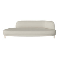 Light beige curved sofa with a smooth texture and minimalistic design. Elegant and versatile for any living space.