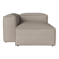 Light beige modular sofa with a smooth, minimalist design and subtle stitching details. Perfect for modern interiors.