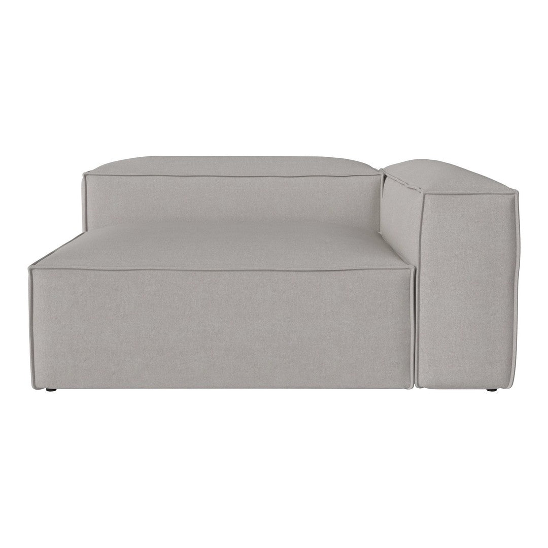 Soft grey sectional sofa with a minimalist design, featuring clean lines and a modern, neutral fabric texture.