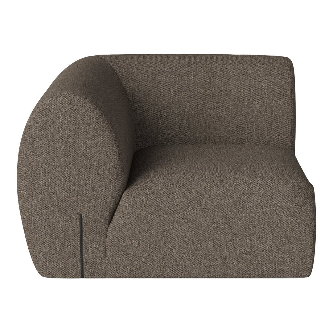 Brown textured armchair with a smooth, rounded silhouette and subtle stitching detail. Perfect for modern decor.