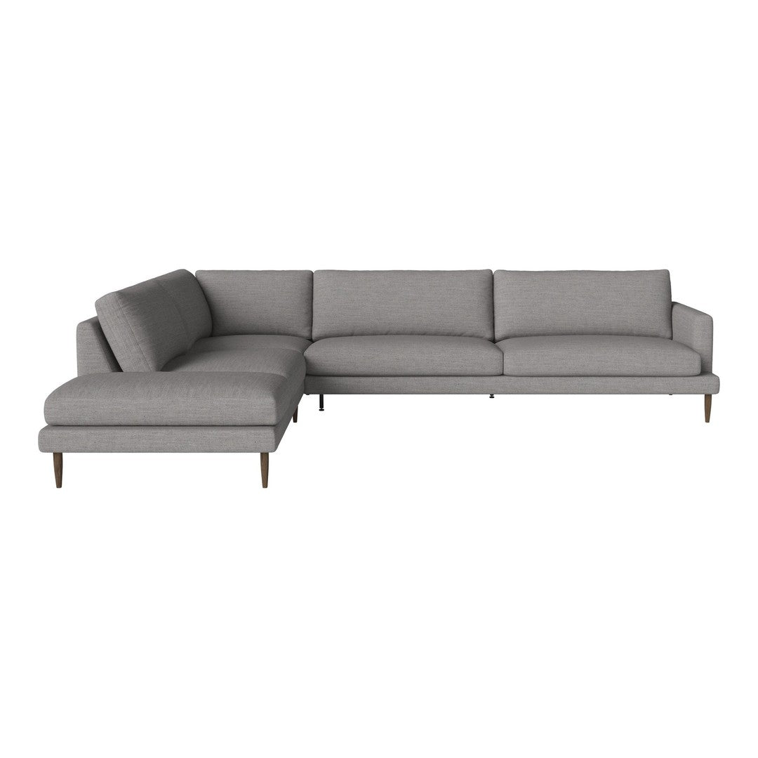 Gray sectional sofa with clean lines and minimalist design, featuring solid fabric upholstery and wooden legs.