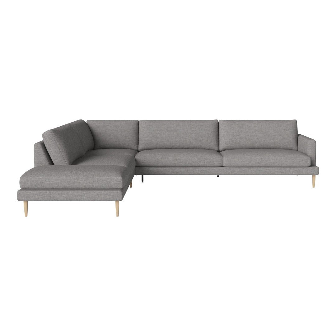 Gray sectional sofa with smooth fabric and minimalist design, featuring light wooden legs for a modern touch.