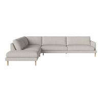 Light gray sectional sofa with clean lines and a modern design, featuring plush cushions and wooden legs.
