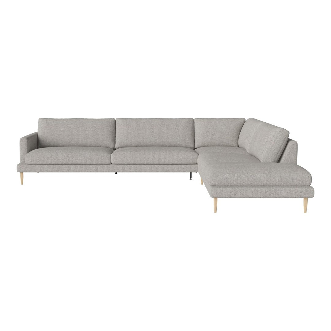 Gray sectional sofa with clean lines and light wooden legs, perfect for modern living spaces.