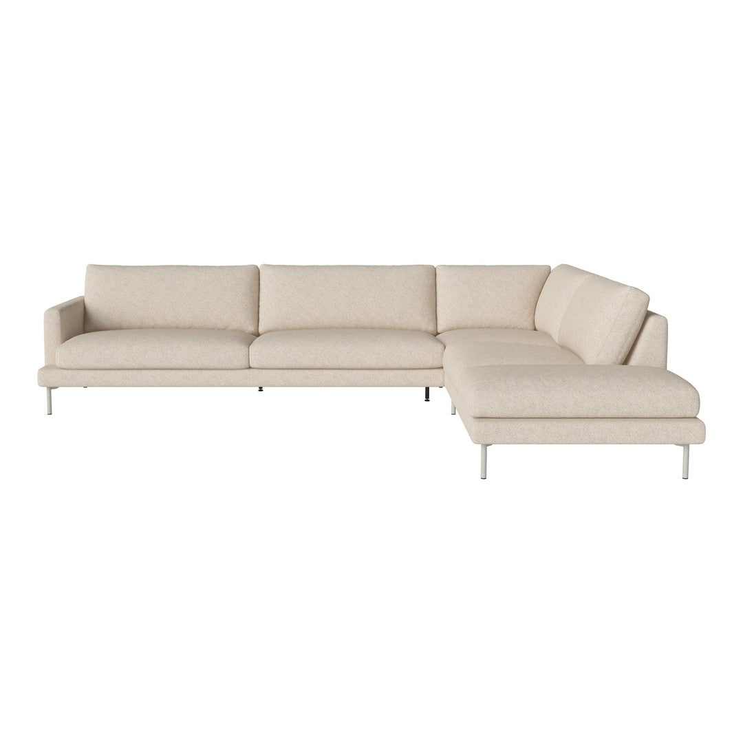 Beige sectional sofa with a smooth, textured fabric and minimalist design, featuring clean lines and chrome legs.