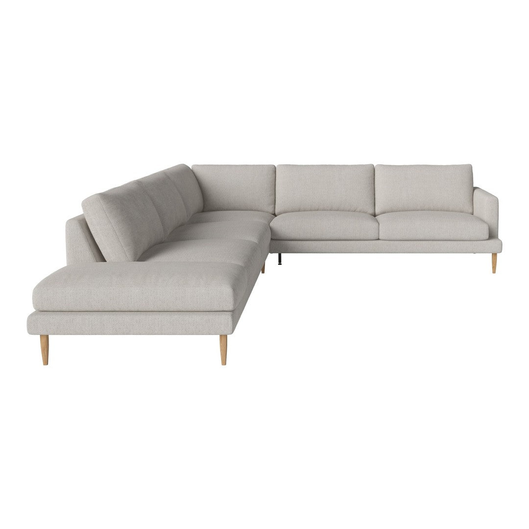 Light gray sectional sofa with a minimalist design and simple pattern, featuring wooden legs for a modern touch.