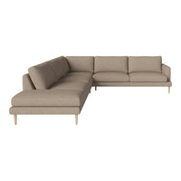 Beige sectional sofa with clean lines and subtle texture, featuring light wooden legs for a modern touch.