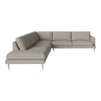 Light gray sectional sofa with a modern, minimalist design and soft, textured upholstery. Perfect for any living space.