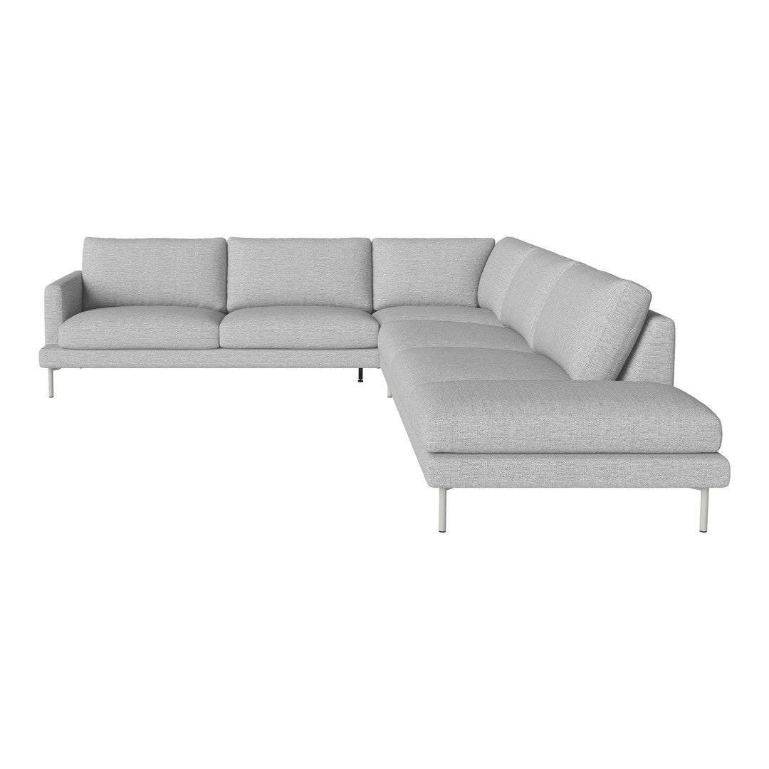 Light gray sectional sofa with clean lines and minimalist design, featuring plush cushions and sleek metallic legs.