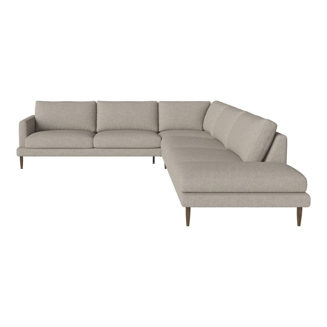 Light gray sectional sofa with a modern design and clean lines, featuring a soft fabric upholstery.