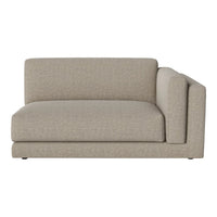 Light beige sectional sofa with a subtle textured pattern, perfect for modern and minimalist decor.